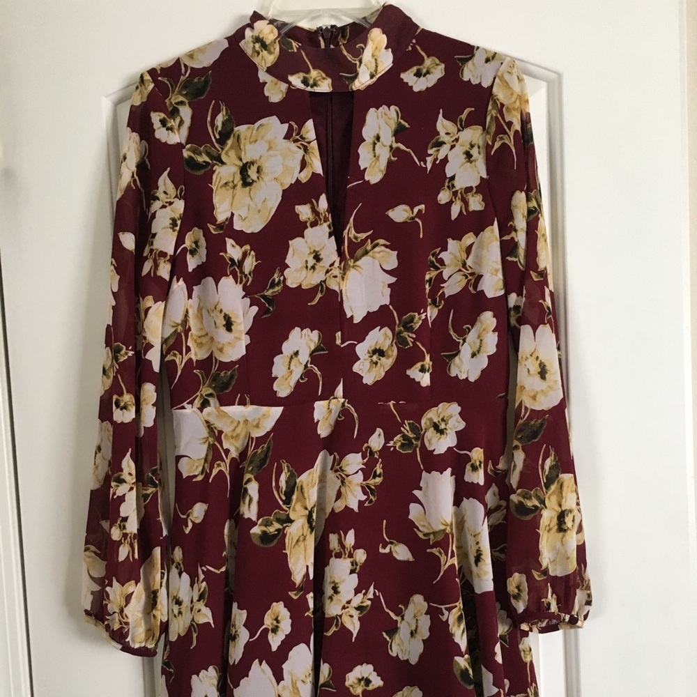 Floral dress with a peak a boo in the front